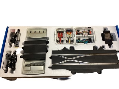 Lot 1974 - Scalextric Digital World Championship multi-car racing with lane changes, lap counter and four racing cars including McLaren Mercedes, Ferrari, Renault & Honda Teams, boxed (1)