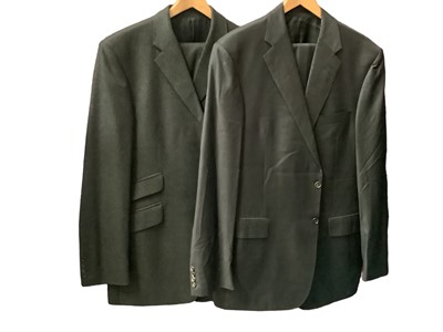 Lot 2119 - Ede & Ravencroft dark grey check wool suit with a spare pair of matching turn-up  trousers, size 44L waist 38L  and a grey wool and cashmere piece suit, with matching spare pair of turn-up trousers...