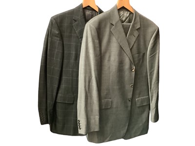 Lot 2120 - Ede & Ravencroft dark grey check wool suit with a spare pair of matching turn-up  trousers, size 44L waist 38L  and a grey wool and cashmere piece suit, with matching spare pair of turn-up trousers...