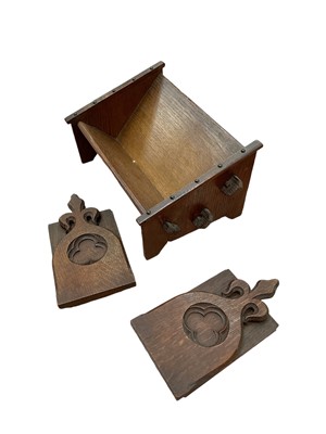 Lot 2545 - Arts and Crafts period oak ecclesiastical bookends in the Gothic style, together with oak arts and crafts period bookrack