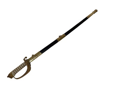 Lot 909 - Victorian British Naval Officers sword by J.Gieve & Sons, Portsmouth with regulation brass gothic hilt with lions head pommel, etched blade decorated with Royal Arms and crowned fouled anchor in it...