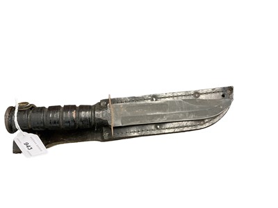 Lot 943 - American military fighting knife with Bowie blade in leather sheath.
