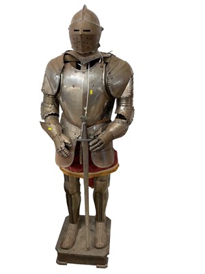 Lot 807 - Reproduction steel suit of armour complete with helm and sword on wooden display stand