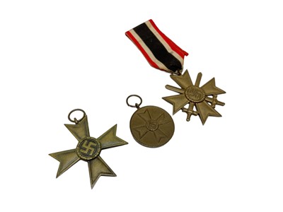 Lot 838 - Nazi War Merit Cross with swords, Nazi War Merit Cross & Nazi War Merit Medal (3)