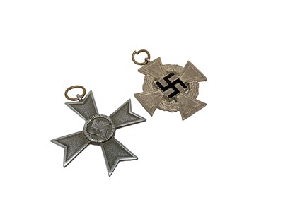 Lot 841 - Nazi Faithful 25 / 40 year service medal and War Merit Cross (2)