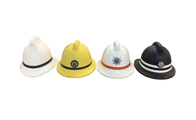 Lot 823 - Group of four Fire Brigade helmets including Suffolk Fire Service (4).