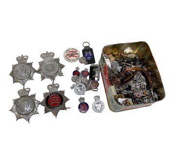 Lot 831 - Collection of British Police badges to include helmet plates and others, (1 box).