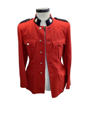 Lot 875 - Elizabeth II Royal Canadian Mounted Police (RCMP) red tunic and an RCMP shirt (2).