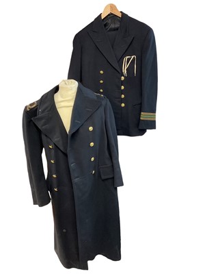 Lot 879 - Second World War Royal Navy Great coat by Gieves Ltd, together with a Navy service jacket and trousers (3)