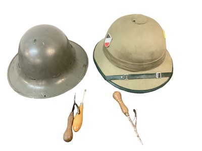 Lot 886 - Two Second World War British Zuckerman Civil Defence helmets, together with other military helmets (1 box).
