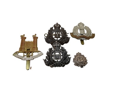 Lot 852 - First World War Suffolk Regiment Officers' silver cap badge (un hallmarked) and other Suffolk badges (5).