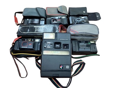 Lot 2364 - Vast quantities of photographic equipment, including cameras, lenses, film, filters, flashes, etc