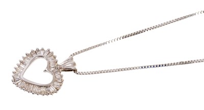 Lot 503 - Diamond heart pendant in 18ct white gold setting on chain