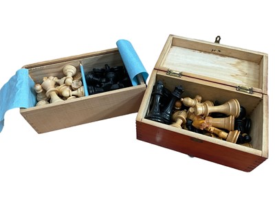 Lot 2613 - Two carved wooden chess sets