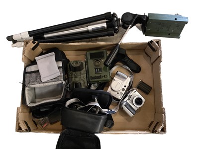 Lot 2365 - Bushnell HD nature view camera and a Victure wildlife camera, together with two Canon cameras and accessories