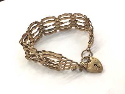 Lot 1002 - 9ct gold gate bracelet with padlock clasp