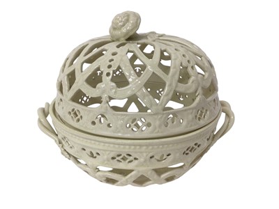 Lot 200 - Creamware pierced round basket and domed cover, circa 1900
