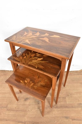 Lot 1448 - Art Nouveau marquetry nest of three tables designed by Émile Gallé