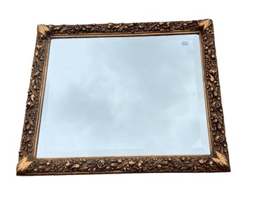 Lot 1213 - Gilt framed wall mirror in ornate frame, 53cm x 64cm