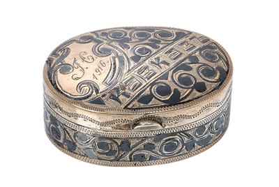 Lot 307 - Imperial Russian silver box of oval form, with niello work decoration
