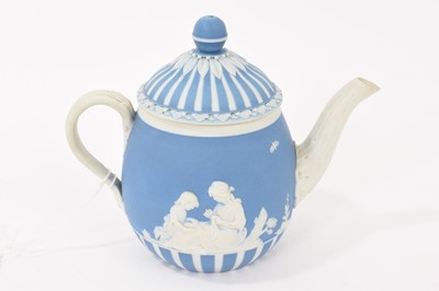 Lot 194 - Wedgwood blue jasper dip solitaire teapot and cover, applied with ‘Lady Templeton’s Domestic Employment’ and ‘Poor Maria’, circa 1785