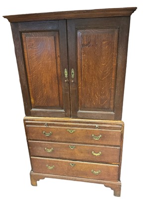 Lot 1407 - George III oak cupboard