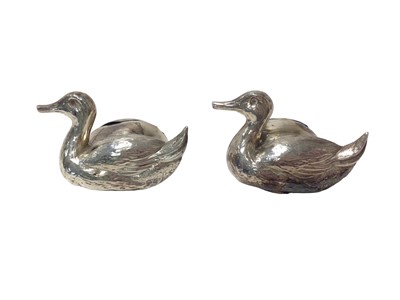 Lot 413 - Pair of silver duck shaped menu holders