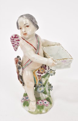 Lot 236 - Chelsea figure of Cupid, holding a rectangular basket, circa 1760