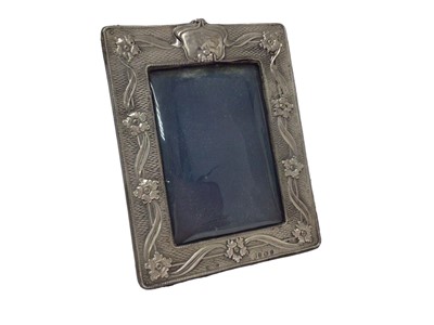 Lot 369 - Edwardian Art Nouveau silver photograph frame with floral decoration and rope twist borders