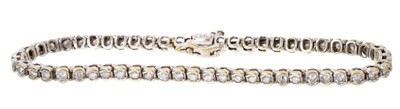 Lot 563 - Diamond tennis bracelet with a line of round brilliant cut diamonds in 18ct white gold setting, estimated total diamond weight approximately 2.00cts.