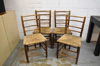 Lot 1497 - Set of four 18th / early 19th century ladder back ash country chairs