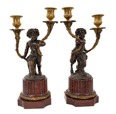 Lot 988 - Good pair of 19th century bronze and ormolu cherub and fawn candelabra after Clodion