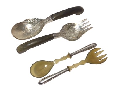 Lot 428 - Pair of antique Eastern white metal servers with horn handles, and another pair