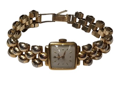 Lot 217 - 1950s Longines ladies wristwatch on replacement gold plated bracelet, together with the same design 9ct gold bracelet