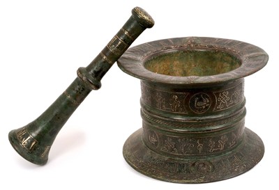 Lot 733 - Fine and large antique Islamic cast bronze pestle and mortar with inlaid silver decoration