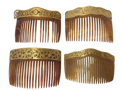 Lot 741 - Four early 20th century 9ct gold mounted tortoiseshell hair combs