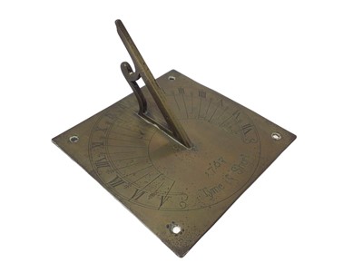 Lot 738 - Antique brass sundial engraved with the legend 'Tyme is short 1707"