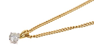 Lot 547 - Diamond single stone ring with a brilliant cut diamond estimated to weigh approximately 0.25ct in four claw 18ct gold setting on 18ct gold chain, 46cm.