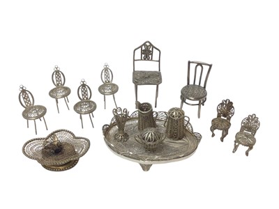 Lot 444 - Collection of silver and white metal filigree items including small chairs, tray and other items.