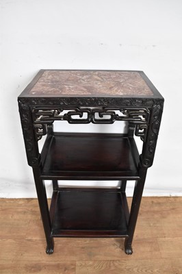 Lot 1519 - Chinese hardwood and marble topped three tier side table, rectangular form with pierced knot frieze and shelves between carved supports, on paw feet, 41cm wide x 30cm deep x 80cm high