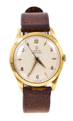 Lot 644 - 1950s Gentlemen's Omega 18ct gold wristwatch with manual-wind 283 calibre 17 jewel movement numbered 12461011, the circular engine turned dial with applied gold Arabic and dart hour markers, centre...