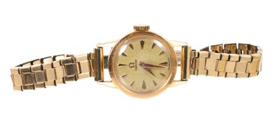 Lot 646 - 1950s ladies Omega with 244 calibre 17 jewel movement, the circular dial with dart hour markers, in an 18ct gold case, 20mm diameter, on later plated bracelet.