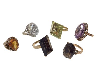 Lot 588 - Six 1970s gold and gem-set cocktail rings, each set with a large gem stone in gold setting (6)