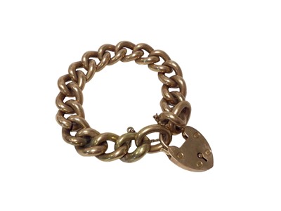 Lot 591 - Edwardian 15ct rose gold curb link bracelet with padlock clasp.