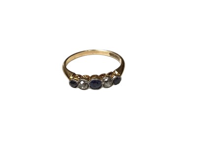 Lot 75 - 18ct gold sapphire and old cut diamond five stone ring in platinum setting on 18ct yellow gold shank, size N½