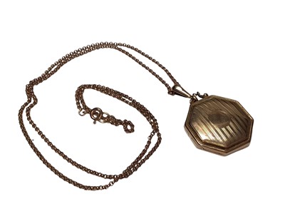 Lot 43 - Victorian 15ct gold octagonal locket pendant on a 9ct gold chain