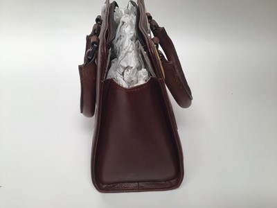 Lot 2071 - Yoshi 'Biscuit' leather handbag with shoulder strap and dust bag.  Five Radley purses with three purse soft bags and three other handbags.