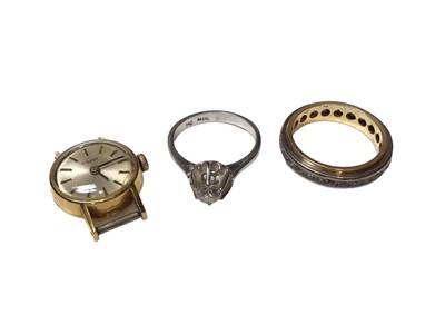 Lot 80 - Yellow and white metal eternity ring, 18ct white gold synthetic white stone single ring and an 18ct gold cased ladies Tissot watch