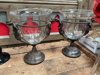 Lot 30 - Pair of Classical-style bronzed metal vases with figure surmounts and glass detachable vases