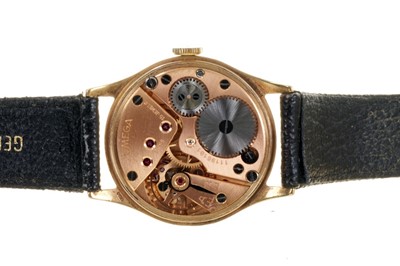 Lot 609 - 1940s gold Omega wristwatch